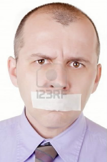 4489866-portrait-of-a-businessman-with-taped-mouth-on-white-background-001.jpg